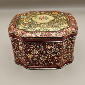 Horner vintage lidded red tin with floral design likely toffee box no contents